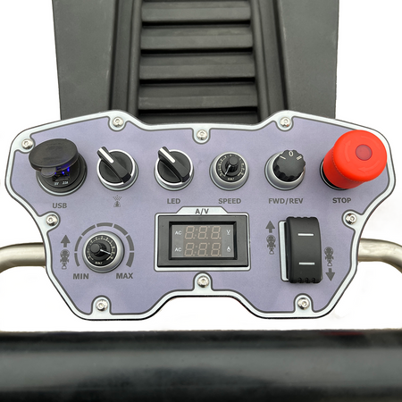 Control panel with various buttons and a digital display on a gray background